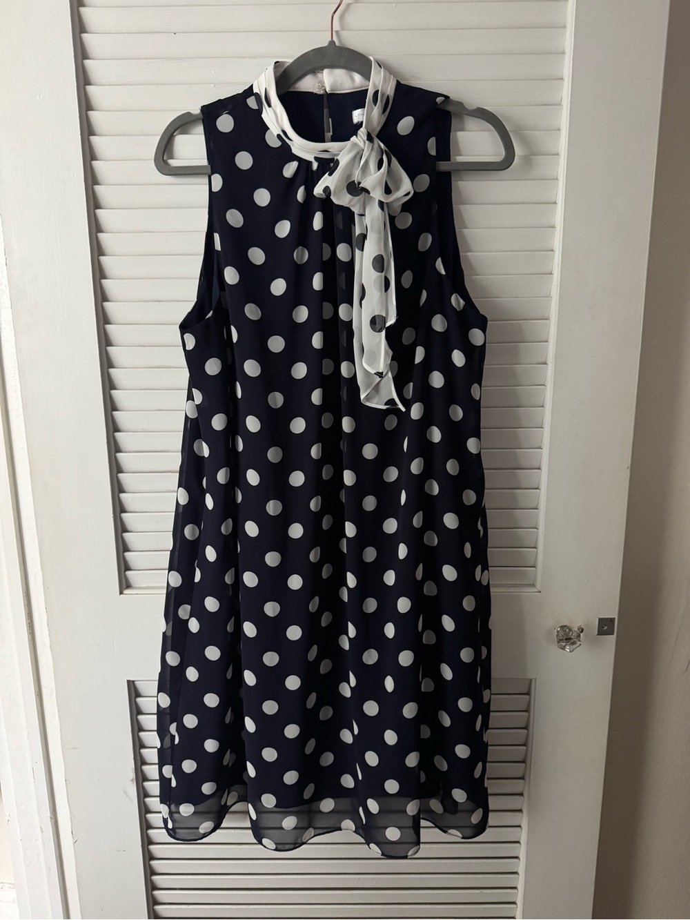 London Times Sleeveless Navy Polka Dot Tie-Neck Dress